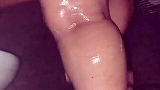 A mature woman performs a bath time solo with self-pleasure