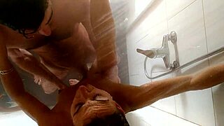Blonde amateur blows big cock in shower, bent over for cum.