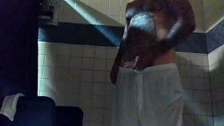 Stroking big tattd up white dick in shower.