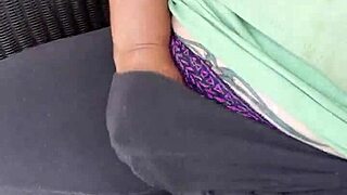 Feeling horny, this young girl plays with her feet and pussy.