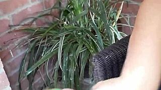 Feeling horny, this young girl plays with her feet and pussy.