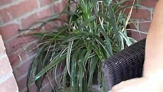 Feeling horny, this young girl plays with her feet and pussy.