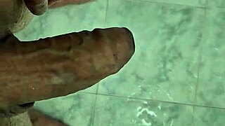 enjoying a solo cum in the shower.