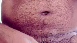 Hottest Indian stud shaves and milks his big black cock
