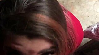 A big natural tits beauty gives blow job in the garage