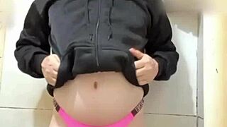 The Sexy Transsexual In Thong Lingerie Shows Off Her Ass