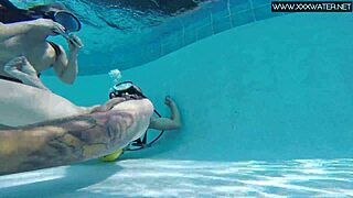 A big cock is used to pleasure a manga while it is in the water