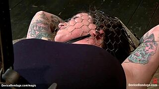 Lesbian BDSM with a kinky dildo and gag