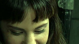 Three men engage in BDSM with a submissive who is gagged and handcuffed