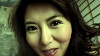 Damn! Hot Japanese babe with natural tits gives close-up handjob!