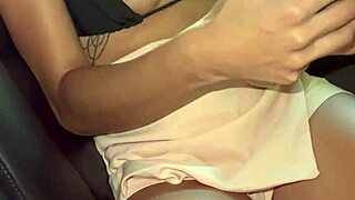 I record my friend performing webcam session in her car outdoors.