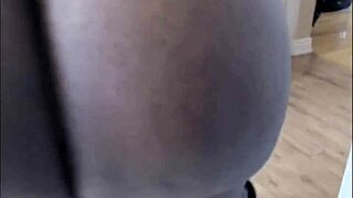 Huge black tits contrast with massive ass