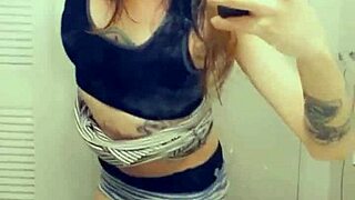 In a miniskirt, the trans woman shows her cock proudly