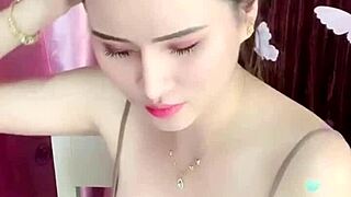 I watch her sexy webcam show.