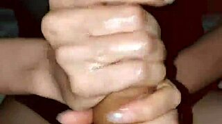 Skinny couple engages in sexy handjob session