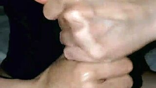 Skinny couple engages in sexy handjob session