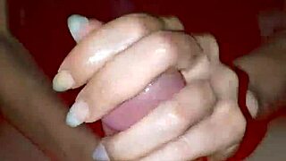 Skinny couple engages in sexy handjob session