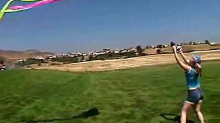 Petite teen rubs clit outdoors sucking popsicle