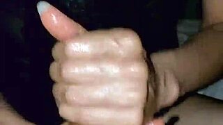 Skinny couple engages in sexy handjob session