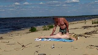 A curvaceous amateur MILF gets all her holes satisfied on the beach