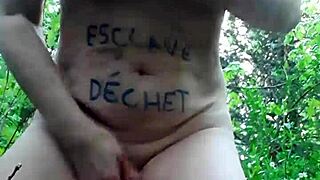 Female slave masturbates in forest bdsm scene