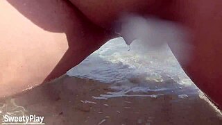 curvy wife’s shaved pussy exposed on public beach