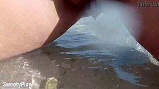 curvy wife’s shaved pussy exposed on public beach