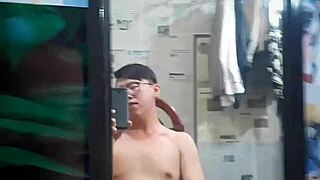 Vietnamese gay top sucks big cock in condom, craving monster dick?