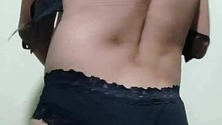 trying on my underwear in front of the mirror