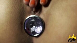 Caroleta Roots Teases with Striptease and Big Ass Tattoo