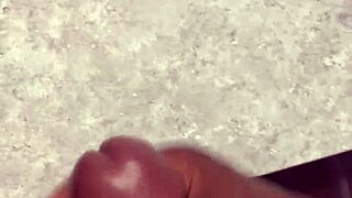 A huge cock cums hard on the bathroom counter