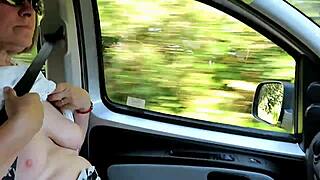 Housewife Flashes Tits While Driving Down Road