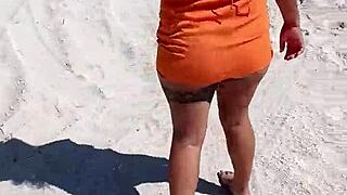 Mexican prostitute displays tits and ass, gets groped on public beach in Mexico.