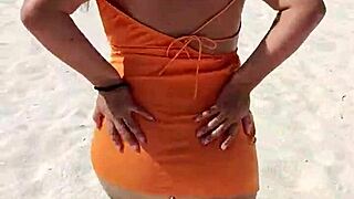 Mexican prostitute displays tits and ass, gets groped on public beach in Mexico.