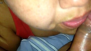 wife sucking dick with intense passion in bedroom.