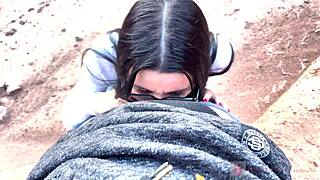 I see her give deep blowjob in canyon