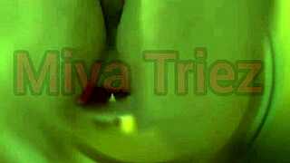 Miya Triez Performs a Seductive Strip Tease