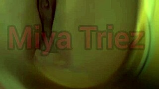 Miya Triez Performs a Seductive Strip Tease