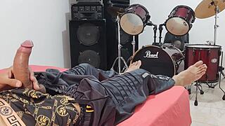 Man strokes his massive cock intensely