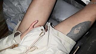 Two brunettes masturbate in a hidden hut