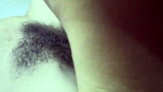 A close up of a MILF’s hairy beaver while being fucked in the missionary position