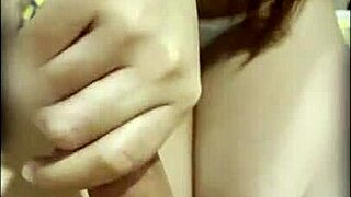 Steamy homemade video of Asian teen giving a handjob