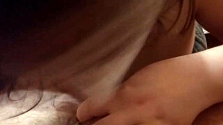 pretty woman enjoys a relaxing session with her partner in bed