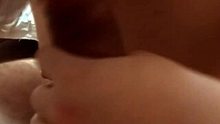 pretty woman enjoys a relaxing session with her partner in bed