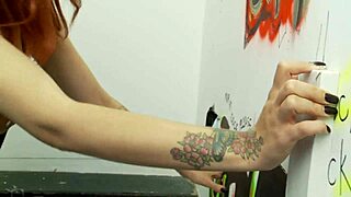 Hot red milf discovers big cock through glory hole