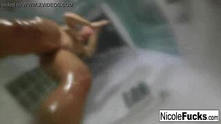 Nicole Aniston enjoys a steamy shower