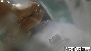 Nicole Aniston enjoys a steamy shower