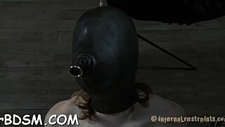 Man, this latex playgirl got punished hard in the garage! So rough! 😈