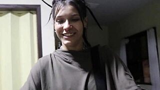 Bartender girl savors a creamy drink after late shift