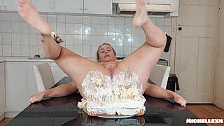 Blonde milf sits on birthday cake messily